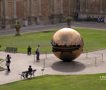 A bronze \"sphere inside a sphere\"  by Arnaldo Pomodoro seen from the window of  Musei del Vaticano
