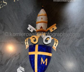 Pope John Paul IIs personal coat of arms at the foot .   Saint Peter s Basilica,  Città del Vaticano
