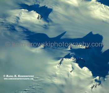 Aerial View of the Alaska Range Through the Airplane Window