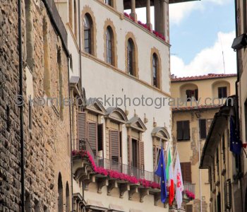 Street side lined by medieval buildings, on the way towards Piazza della Signoria, Florence