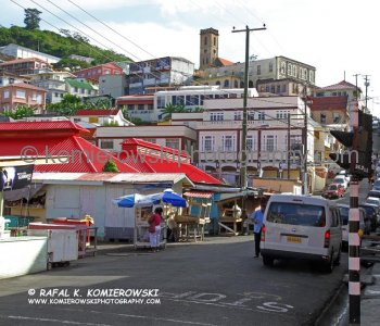 Passing the red tiled roofs and spice markets of Grenadas capital, St Georges we walked uphill to  cathedral...