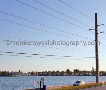 Power lines ran along The Overseas Highway, the southernmost leg of U.S. Highway 1 and sometimes called the Highway That Goes to Sea