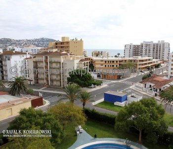 we are here after summer season....view of the nearby hotels alongside the Bay of Roses on the Costa Brava coastline