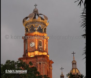 Rising above the town square is the landmark steeple of the Cathedral of Our Lady of Guadalupe. Puerto Vallarta, Mexico