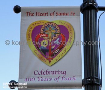 Banner  near the Cathedral Basilica of Saint Francis of Assisi, built 1869, Santa Fe, New Mexico
