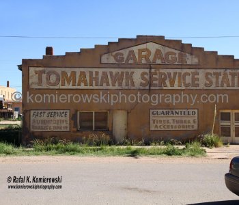 Old Garage Tomahawk Service Station ( not in service!)    seen across Main Street from  Shaffer Hotel Mountainair.