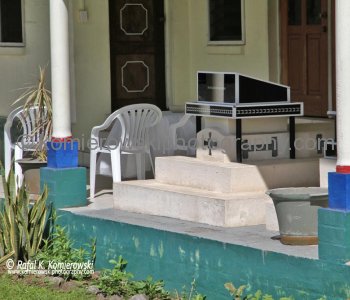 Tombs  and house....Upolu island, Samoa