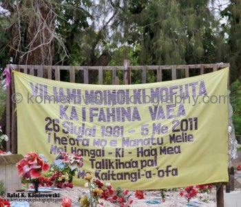 Tongan cemeteries are unique, usually set in a grove of frangipani trees, the graves are strange, sandy mounds marked with flags and banners