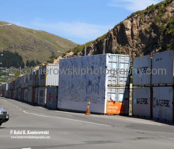 Shipping containers  protecting street in Sumner, New Zealand.