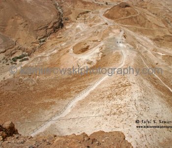Masada, Romans....built a circumvallation wall and then a rampart against the western face of the plateau, using thousands of tons of stones and beaten earth.