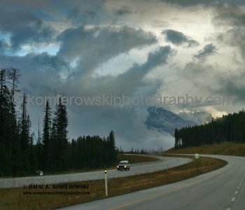 Eastbound-west of Banff. While driving your car imagine your self 130 years years back in time. Here early explores ventured through the Rockies to find a passage to the Pacific Ocean. What a strenuous task?
