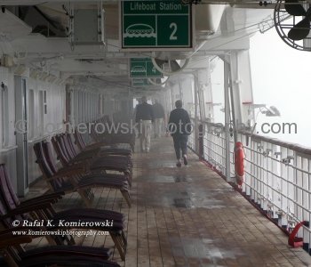 View of Promenade Deck under fog on the M/S Rotterdam during slow cruising the Suez Canal